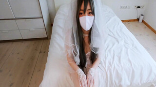 Chinese Bride in wedding dress reaches orgasm